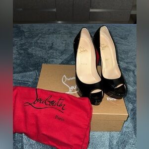 Christian Louboutin peep toe pumps